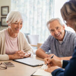 Senior couple planning their investments with financial advisor